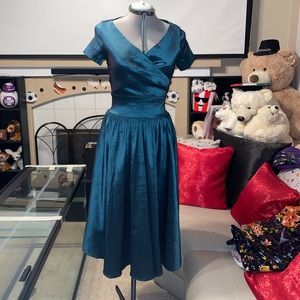 **Sold** Pinup Girl Teal Ava Swing